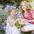 Mother and daughter on Easter looking for eggs outdoors smiling stock photo © monkey_business