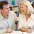 Mature student laughing with tutor in library stock photo © monkey_business