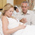 Pregnant woman in pain with husband in hospital stock photo © monkey_business