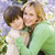 Mother and son outdoors embracing and smiling stock photo © monkey_business