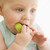 Baby eating apple indoors stock photo © monkey_business