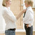 Woman in front hallway fixing young boy's tie and smiling stock photo © monkey_business