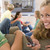 Teenagers Hanging Out In Front Of Television Using Mobile Phones stock photo © monkey_business