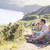 Family on cliffside path using binoculars and smiling stock photo © monkey_business