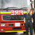 Portrait of firefighters standing by a fire engine stock photo © monkey_business