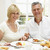 Middle Aged Couple Enjoying Hotel Breakfast stock photo © monkey_business
