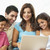 Family Sitting On Sofa At Home With Laptop stock photo © monkey_business
