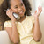Young girl in living room using telephone and smiling stock photo © monkey_business