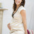Pregnant woman sitting in living room smiling stock photo © monkey_business