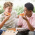 Teenage Boys Sitting On Couch Eating Pizza Together stock photo © monkey_business