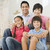 Family sitting on staircase smiling stock photo © monkey_business