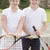 Two young friends with rackets on tennis court smiling stock photo © monkey_business