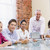 Five businesspeople in boardroom with laptop stock photo © monkey_business