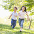 Brother and sister running outdoors smiling stock photo © monkey_business