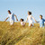 Family running outdoors holding hands smiling stock photo © monkey_business