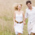 Couple running outdoors holding hands smiling stock photo © monkey_business