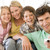 Family in living room with remote control smiling stock photo © monkey_business