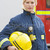 Portrait of a firefighter standing in front of a fire engine stock photo © monkey_business