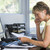 Woman in home office with computer and paperwork stock photo © monkey_business