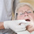 dentist · examen · cameră · femeie · scaun - imagine de stoc © monkey_business