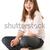 giovane · ragazza · seduta · studio · ragazza · bambini · felice - foto d'archivio © monkey_business
