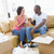 Couple toasting champagne by boxes in new home smiling stock photo © monkey_business