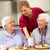 Senior women with carer enjoying meal at home stock photo © monkey_business
