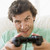 Man in living room playing videogames smiling stock photo © monkey_business