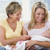 Grandmother and mother in living room with baby smiling stock photo © monkey_business