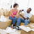Couple relaxing with champagne by boxes in new home smiling stock photo © monkey_business