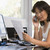 Woman in home office with paperwork using telephone stock photo © monkey_business
