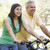 Man and girl on bikes outdoors smiling stock photo © monkey_business
