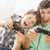 Man and young boy with video game controllers smiling stock photo © monkey_business