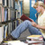 student · lucru · bibliotecă · masculin · şedinţei · podea - imagine de stoc © monkey_business