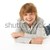 Young Boy Lying On Stomach In Studio stock photo © monkey_business