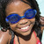 Young girl in swimming pool wearing goggles smiling stock photo © monkey_business