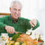 Man Carving Up Turkey At Christmas Dinner stock photo © monkey_business