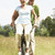 Mature couple riding bike in countryside stock photo © monkey_business