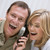 Couple receiving good news over the phone stock photo © monkey_business