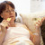 избыточный · вес · женщину · расслабляющая · диван · девушки · джинсов - Сток-фото © monkey_business