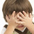 Studio Portrait Of Young Boy Covering Eyes stock photo © monkey_business
