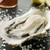Opened Rock Oyster with Hot Chilli Sauce Lemon and Sea Salt stock photo © monkey_business