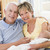 Grandparents in living room with baby smiling stock photo © monkey_business