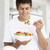 Young Man Eating A Salad stock photo © monkey_business