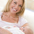母親 · リビングルーム · 赤ちゃん · 笑みを浮かべて · 肖像 · 赤ちゃん - ストックフォト © monkey_business