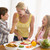 Mother And Children Prepare A meal,mealtime Together  stock photo © monkey_business