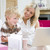Woman and young boy in home office with laptop smiling stock photo © monkey_business