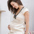 mujer · embarazada · sesión · salón · sonriendo · familia · embarazadas - foto stock © monkey_business