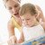 Mother and baby reading book indoors and pointing stock photo © monkey_business