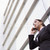 üzletasszony · beszél · mobiltelefon · kívül · modern · iroda - stock fotó © monkey_business
